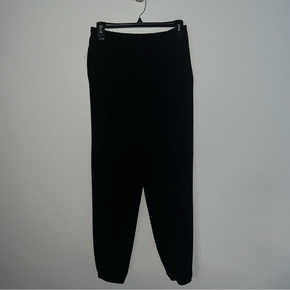 Lush black pants 
made in China size small
100% polyester - Picture 14 of 15